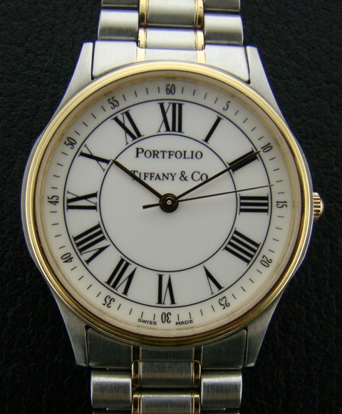 (image for) A TIFFANY STEEL & GOLD WATCH